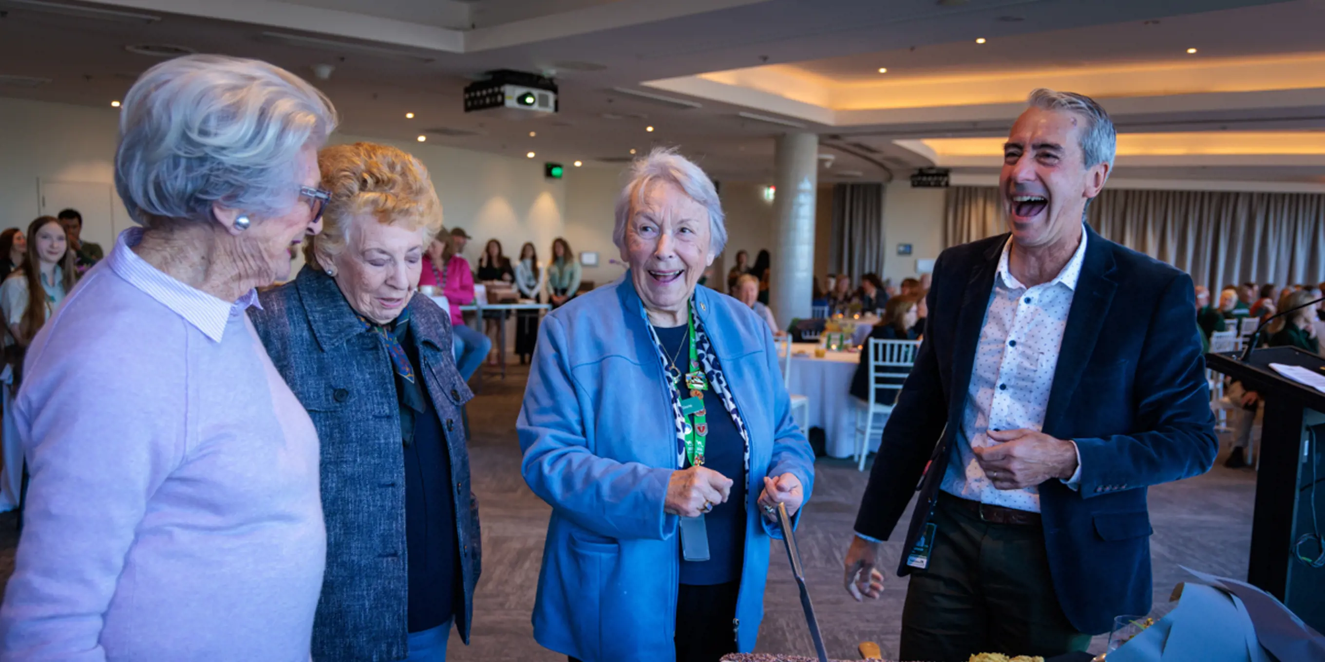 Cam Kerr with Gloria & Margaret celebrating their 50 Years Service Volunteering