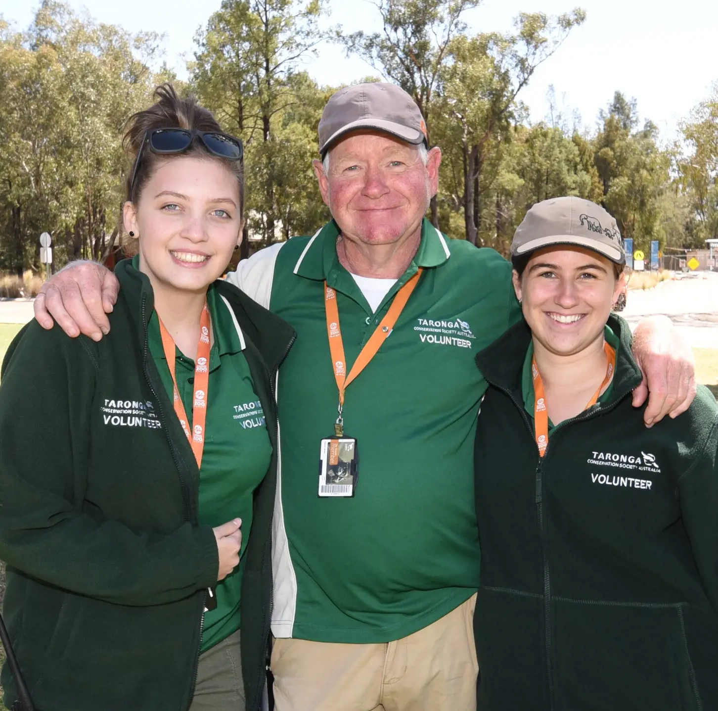 Three Volunteers standing together at Dubbo